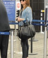 Demi_Lovato_departing_Burbank_Airport_281029.jpg