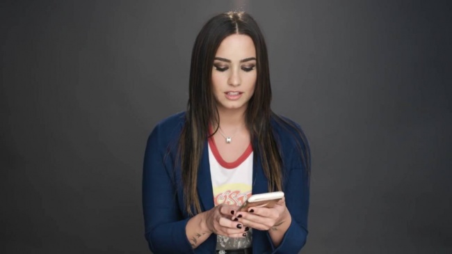 Demi_Lovato_Gets_Her_Phone_Hacked_-_Glamour5Bvia_torchbrowser_com5D_28129_mp40276.jpg