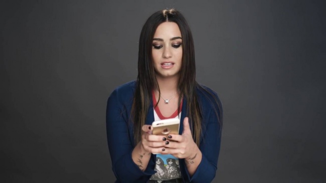 Demi_Lovato_Gets_Her_Phone_Hacked_-_Glamour5Bvia_torchbrowser_com5D_28129_mp41892.jpg
