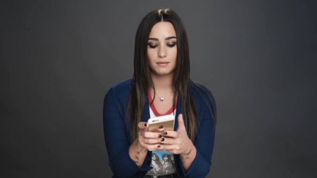 Demi_Lovato_Gets_Her_Phone_Hacked_-_Glamour5Bvia_torchbrowser_com5D_28129_mp41895.jpg