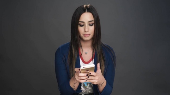 Demi_Lovato_Gets_Her_Phone_Hacked_-_Glamour5Bvia_torchbrowser_com5D_28129_mp41914.jpg
