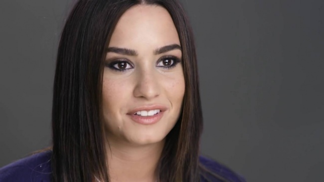 Demi_Lovato_Gets_Her_Phone_Hacked_-_Glamour5Bvia_torchbrowser_com5D_28129_mp42212.jpg