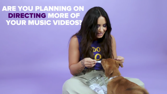 Demi_Lovato_Plays_With_Puppies_28While_Answering_Fan_Questions295Bvia_torchbrowser_com5D_mp43857.png