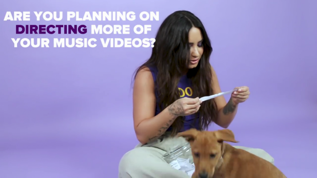 Demi_Lovato_Plays_With_Puppies_28While_Answering_Fan_Questions295Bvia_torchbrowser_com5D_mp43921.png