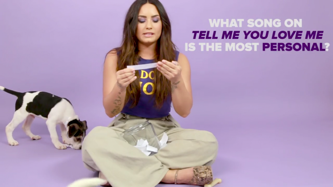 Demi_Lovato_Plays_With_Puppies_28While_Answering_Fan_Questions295Bvia_torchbrowser_com5D_mp45952.png