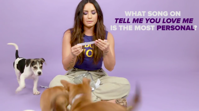Demi_Lovato_Plays_With_Puppies_28While_Answering_Fan_Questions295Bvia_torchbrowser_com5D_mp45992.png