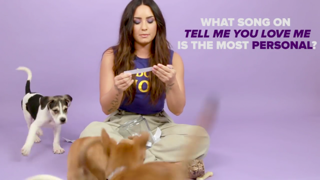 Demi_Lovato_Plays_With_Puppies_28While_Answering_Fan_Questions295Bvia_torchbrowser_com5D_mp45993.png