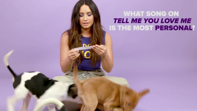 Demi_Lovato_Plays_With_Puppies_28While_Answering_Fan_Questions295Bvia_torchbrowser_com5D_mp46016.png