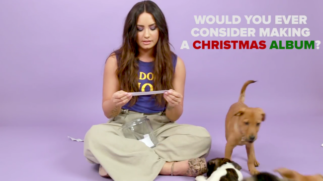 Demi_Lovato_Plays_With_Puppies_28While_Answering_Fan_Questions295Bvia_torchbrowser_com5D_mp46497.png