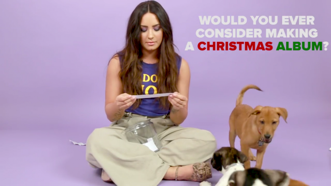 Demi_Lovato_Plays_With_Puppies_28While_Answering_Fan_Questions295Bvia_torchbrowser_com5D_mp46504.png