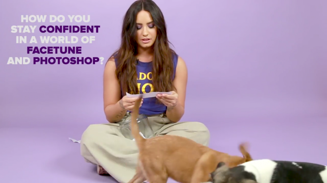 Demi_Lovato_Plays_With_Puppies_28While_Answering_Fan_Questions295Bvia_torchbrowser_com5D_mp46818.png