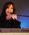 64138_Preppie_Demi_Lovato_performing_live_at_The_Apple_Store_in_London_04_22_09_692__122_541lo.jpg