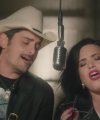 Brad_Paisley_-_Without_a_Fight_ft__Demi_Lovato5Bvia_torchbrowser_com5D_mp44300.png